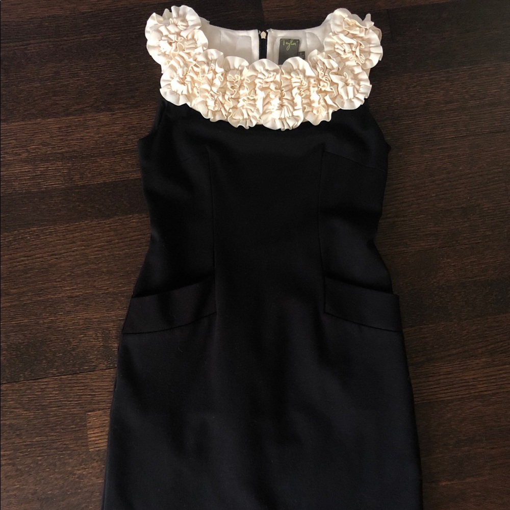 Black cocktail dress with rushed cream collar